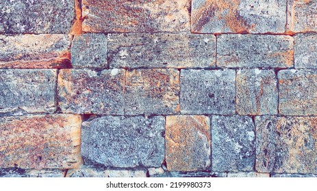 Stone Wall. Graphic Brickwork Construction. Brick Pattern Background. Toned Photo With Filter