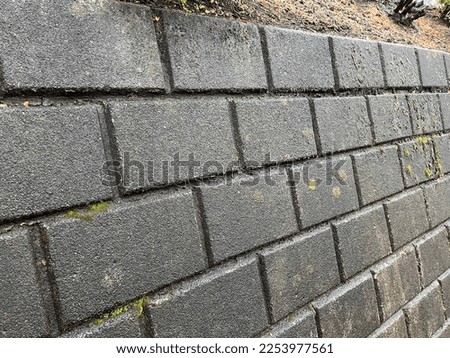 a stone wall in rainyday