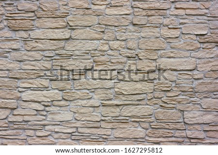 Stone wall. Stonework The example of stonework as exterior wall facing.