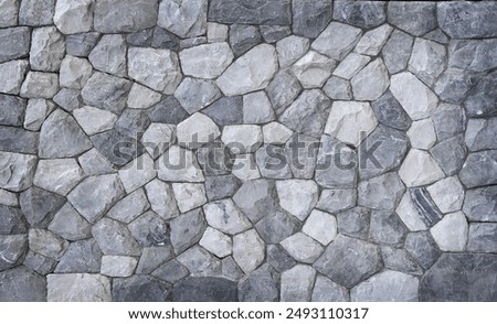 Stone wall texture background - grey stone siding 