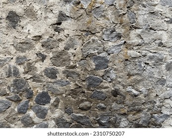 the stone walls look worn with age - Shutterstock ID 2310750207