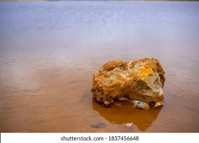 Stone In Water At The Old Ilmenite Quarry