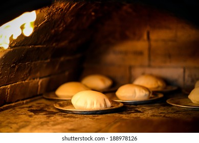 Stone Wood Oven With Fire Baking Fresh Homemade Bread