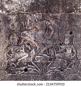 Stone-carved bas-relief with dancing apsaras in anciant Khmer  temple in Angkor complex, Siem Reap, Cambodia