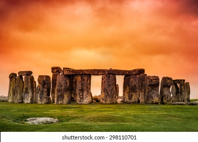 Stonehenge against fiery orange sunset sky