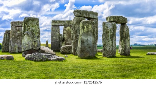 Stonehenge - ancient prehistoric stone monument near Salisbury, Wiltshire, UK. It was built anywhere from 3000 BC to 2000 BC. Sunset. Stonehenge is a UNESCO World Heritage Site in England.