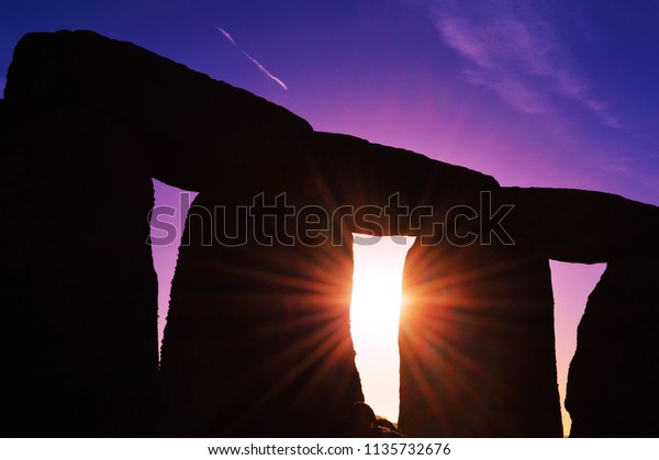 Stonehenge during the Autumn\
Equinox Sunrise - Amesbury, Wiltshire, United Kingdom - September\
21, 2015