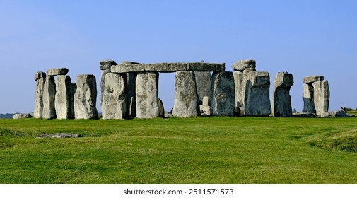 Stonehenge, Wiltshire, United Kingdom, August 29, 2024. Atmospheric ancient prehistoric neolithic stone circle or monument Focus on outer Sarsen stone circle. Outdoors on a sunny summer day - Powered by Shutterstock