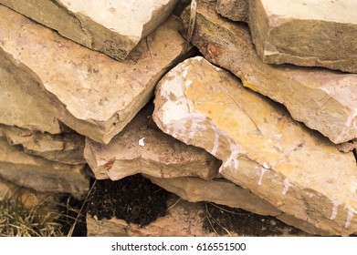 Stonemasonry On The Flower Beds Along The Houses