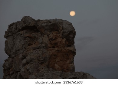 Stones of an ancient building illuminated by the light of the full moon - Powered by Shutterstock