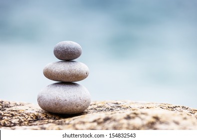 Stones Balance, Pebbles Stack Over Blue Sea. Crimea, Ukraine, Europe. Beauty World.