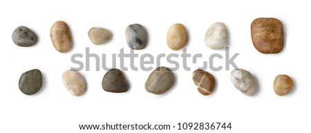 Stones collection. Different kind of pebbles stones with a soft shadow against white background.