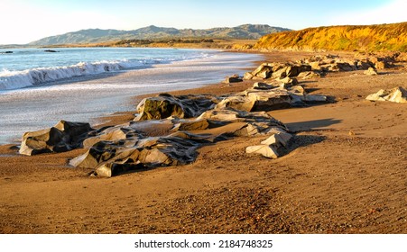 Stones Protruding On A California Central Coast Beach