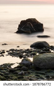 Stones In The Sea On A Long Exposure. Portrait Capture