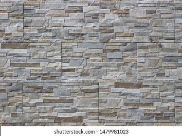 Stoneware cladding wall with stone effect. Veneer, background and texture.