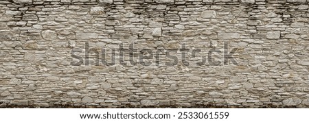 Stonework panoramic  background. The texture of the stone wall.