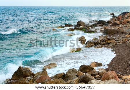 Similar – Foto Bild Felsstrand wie aus Jade