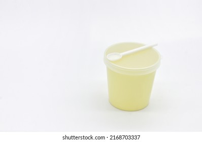 Stool test container with scoop on white background,
