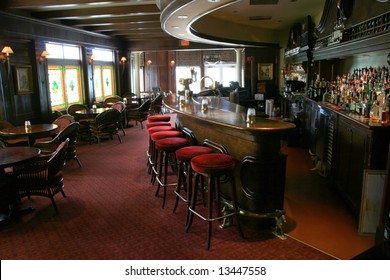 Stools lined up in a tavern