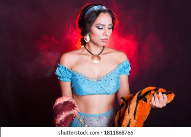 Stop Animal Killing Concept - Pretty Girl Show Animal Skin And Raw Meat That She Wants To Tell Someone Don't Kill Animals Or Stopped Violence Against Animal.