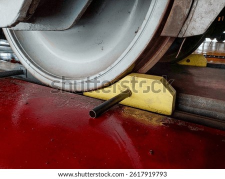 stop block is a tool that functions to block train wheels