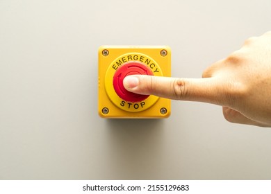 Stop Button and the Hand of Worker About to Press it. emergency stop button. Big Red emergency button or stop button for manual pressing. - Shutterstock ID 2155129683