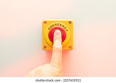 Stop Button and the Hand of Worker About to Press it. emergency stop button. Big Red emergency button or stop button for manual pressing. - Shutterstock ID 2257619311