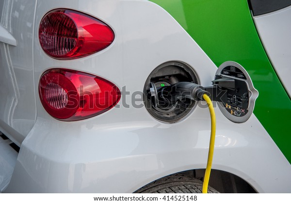 stop for charging cars\
to electricity