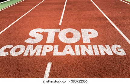 Stop Complaining Written On Running Track