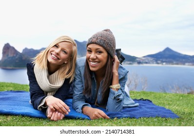 Stop And Enjoy The View. Two Young Women Laughing Outside.