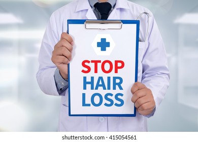 STOP HAIR LOSS
Portrait Of A Doctor Writing A Prescription