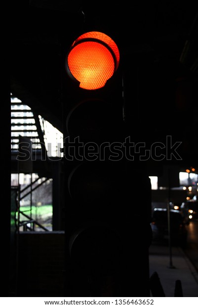 Stop Light,\
Traffic Light Red stop light under a bridge, dark background, car\
transportation sign signal