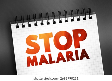 Stop Malaria text on notepad, medical concept background