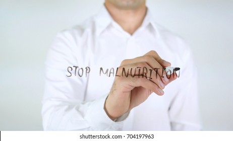 Stop Malnutrition, Man Writing On Glass