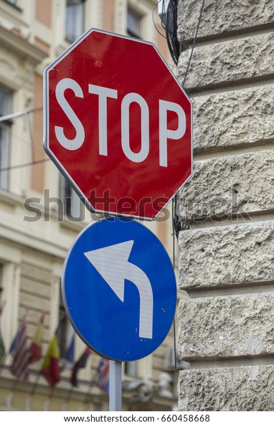 Stop and mandatory
to the left road signs