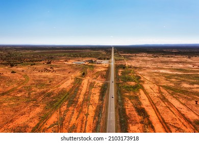 Stop Over Rest Area And Fuel Station Roadhose Motel On Barrier Highway In Far West Outback Of Australia - Aerial Landscape.