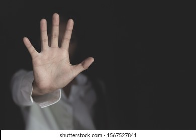 Stop sexual harassment and violence against women, rape and sexual abuse concept,  STOP gesture with hand, Stop drugs,  human rights violations, human trafficking, Copy space. - Shutterstock ID 1567527841