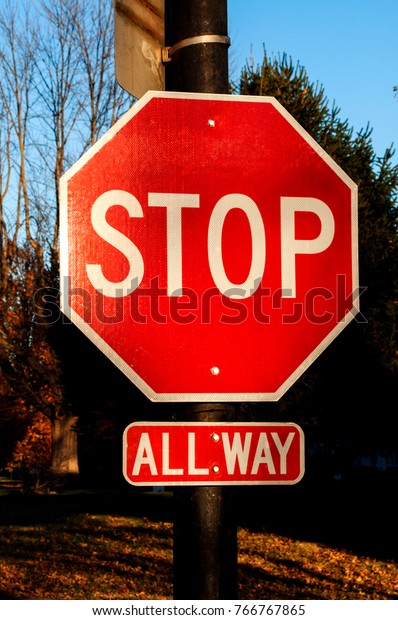 Stop sign, with\
all way sign for four way\
stop