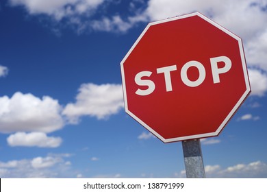 Stop Sign Blue Sky White Clouds Stock Photo 138791999 | Shutterstock