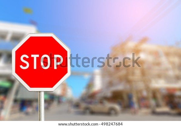 Stop sign by the City\
road