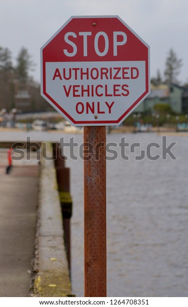 Stop sign at commercial fishing boat marina\
Warrenton, Oregon