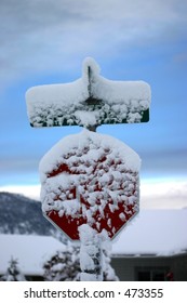 Stop Sign Covered With Snow