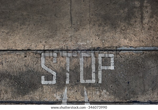 stop sign on surface of\
street
