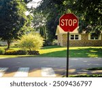 Stop Sign, Street Sign, and Shadows