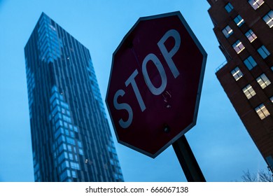 Stop Sign Two Buildings Under Deep Stock Photo 666067138 