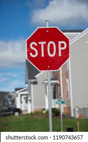 Stop sign at a typical middle class street. Do not stop the American Dream