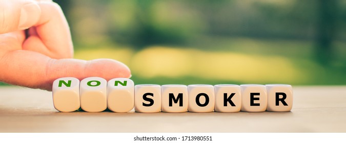 Stop Smoking Concept. Hand Turns Dice And Changes The Word 