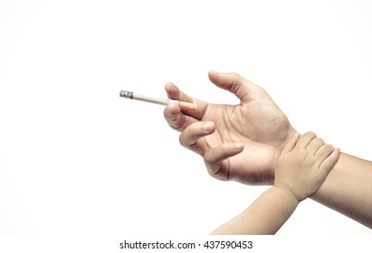 Stop Smoking. Hand Of A Baby Touching Hand Of A Father With A Cigarette. Dad Stop Smoking Concept. World No Tobacco Day