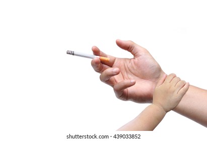 Stop Smoking. Hand Of A Baby Touching Hand Of A Father With A Cigarette. Dad Stop Smoking Concept. World No Tobacco Day.                               