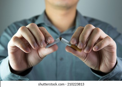 Stop smoking message shown by breaking a cigarette